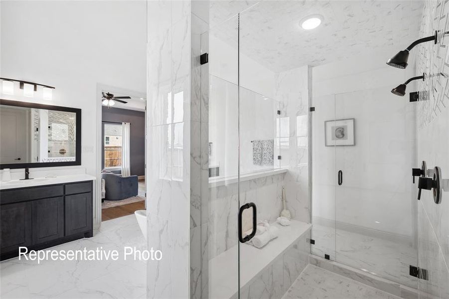 Contemporary bathroom featuring a spacious walk-in shower with dual matte black shower heads