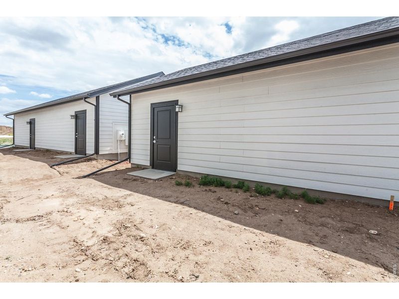 Exterior details and patio area of a home in Prairie Song Story Collection - Single Family Homes, Windsor (Image 26).