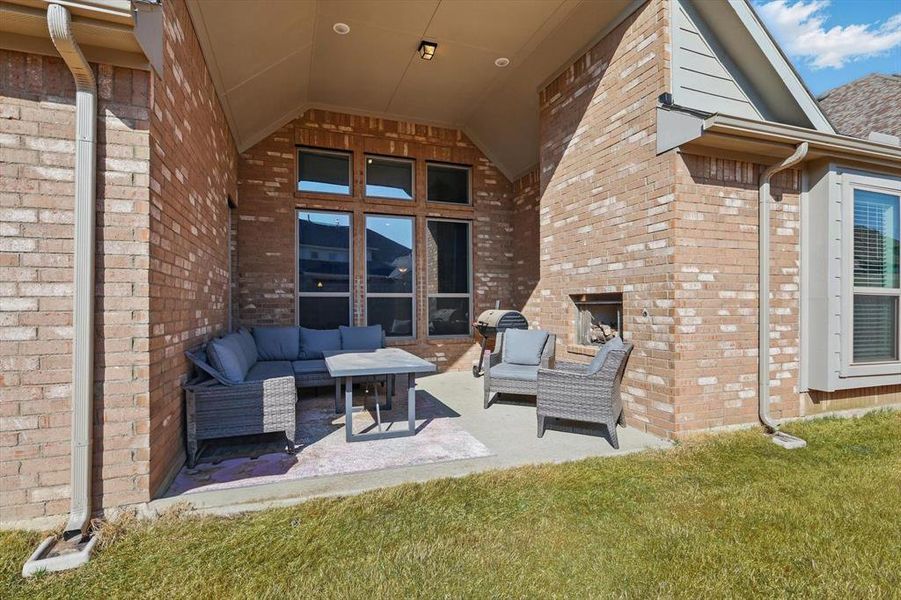 The Roof Covered Patio also features an Outdoor Fireplace for enjoying cozy fall evenings.  There is the added feature of a gas jet so you can have a gas grill is you want.