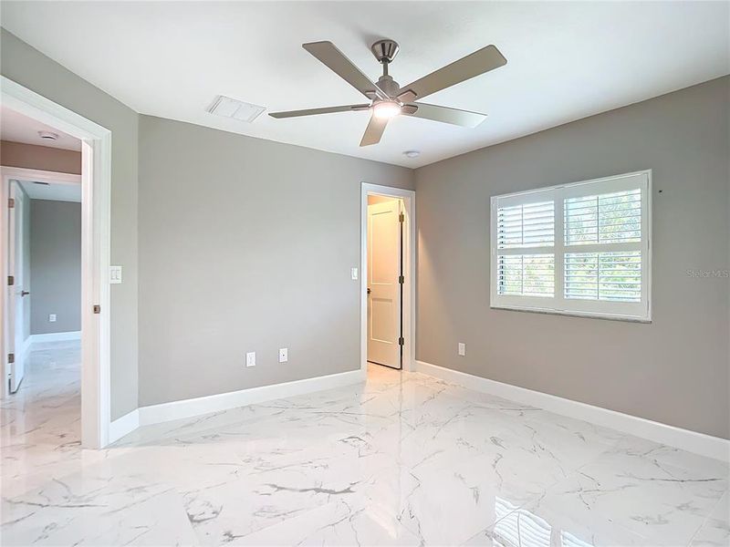Spacious, unfurnished interior of a new home in , Port Charlotte (Image 32).