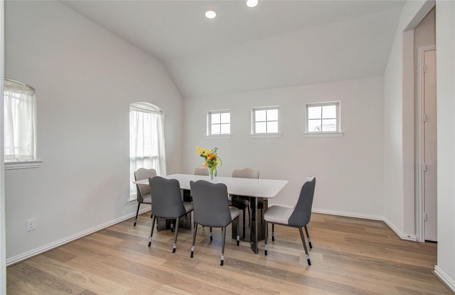 Furnished interior view inside a new home in Sunterra, Katy (Image 27).