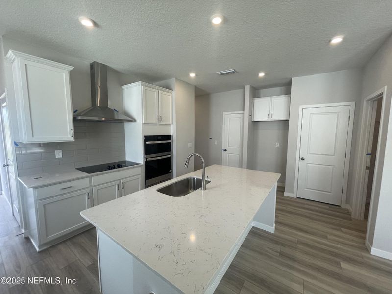 Furnished interior view inside a new home in Palm Series at Seminole Palms, Palm Coast (Image 11).