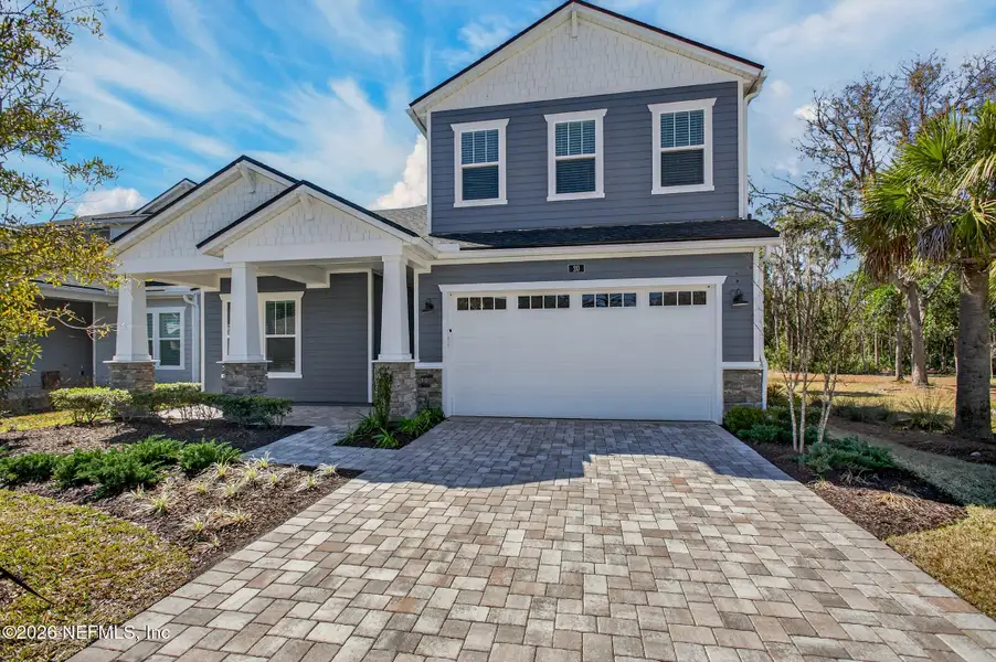 Front exterior of a new home in , St. Johns, FL, highlighting curb appeal (Image 29).