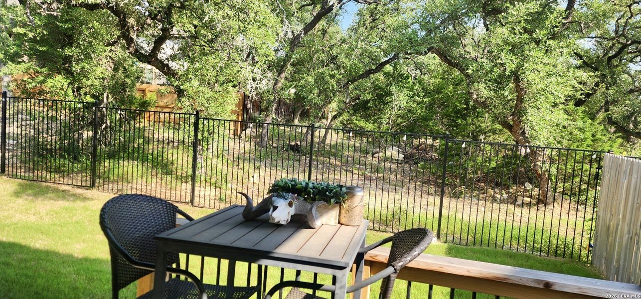 Exterior details and patio area of a home in Ventana, Bulverde (Image 28).