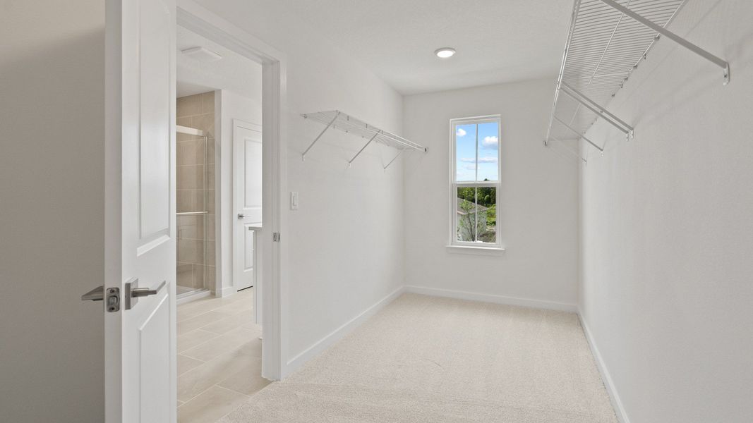 Highbourne Second Floor Primary en Suite Walk-in Closet by DRB Homes in Willowbrook North located in Winter Haven, FL. Highbourne Second Floor Primary en Suite Walk-in Closet by DRB Homes in Willowbrook North located in Winter Haven, FL.