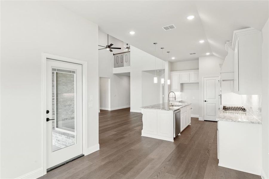 Furnished interior view inside a new home in Chaparral Park, Oak Point (Image 8). Furnished interior view inside a new home in Chaparral Park, Oak Point (Image 8).
