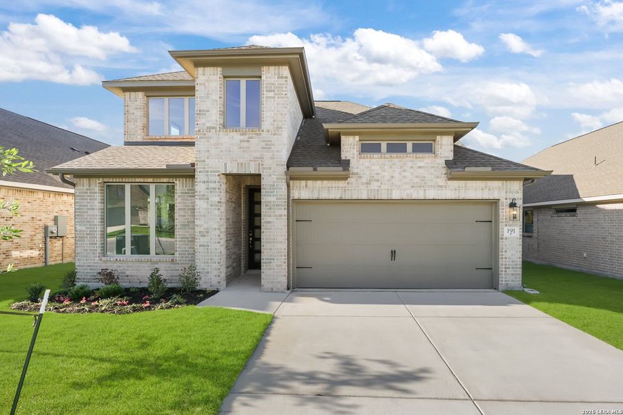 Front exterior of a new home in Nopal Valley, San Antonio, TX, highlighting curb appeal (Image 26).
