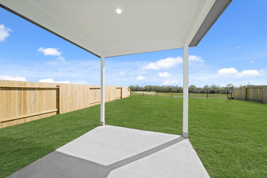 Exterior details and patio area of a home in Paloma at Sanford Farms, Waller (Image 16). Exterior details and patio area of a home in Paloma at Sanford Farms, Waller (Image 16).