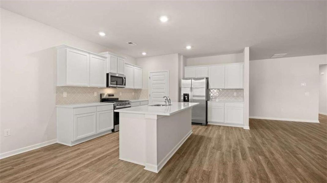 Furnished interior view inside a new home in Preserve at Dove Creek, Statham (Image 10).