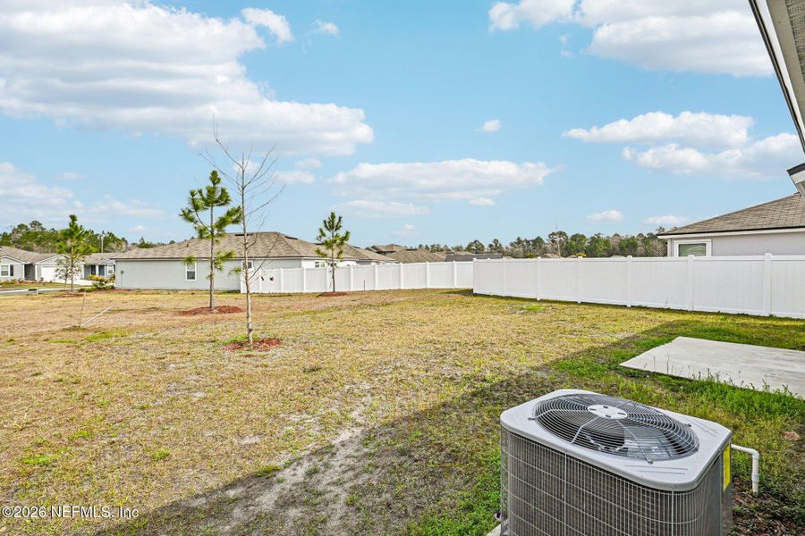 Exterior details and patio area of a home in Cross Creek Express, Green Cove Springs (Image 23).