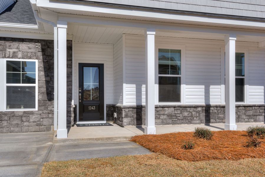 Exterior details and patio area of a home in The Beacon at Old Peachtree Single Family Homes, Lawrenceville (Image 79).