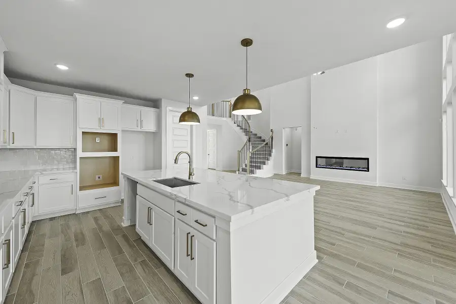 Furnished interior view inside a new home in Bridgeland, Cypress (Image 5).