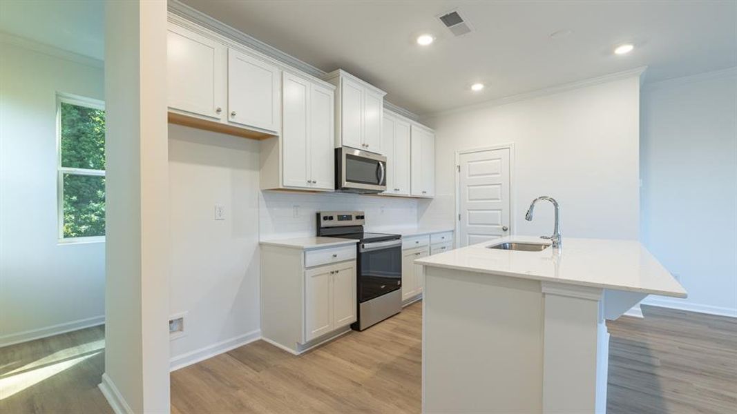 Furnished interior view inside a new home in Benteen Reserve, Atlanta (Image 2). Furnished interior view inside a new home in Benteen Reserve, Atlanta (Image 2).