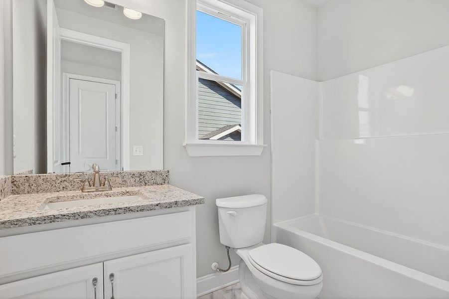 Furnished interior view inside a new home in , Homer (Image 5).