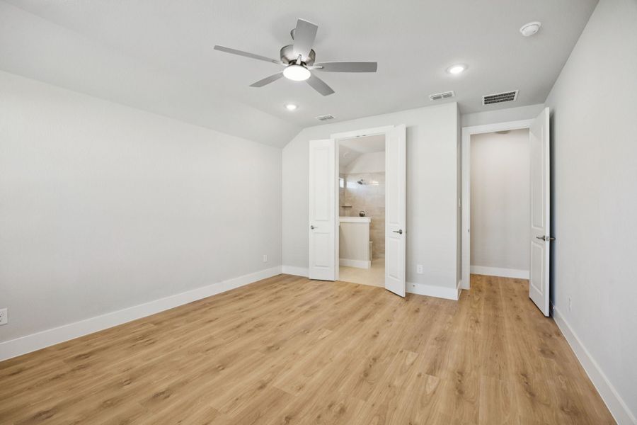 Representative unfurnished interior of a home built from the Adolphus by Centre Living Homes in Painted Tree Woodland West, McKinney (Image 27).