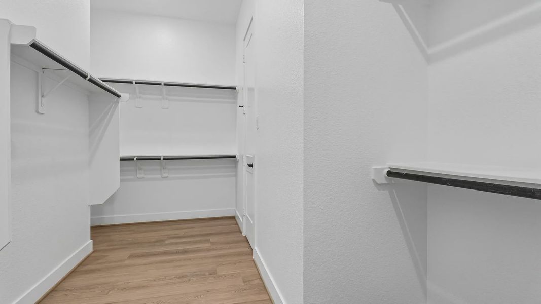 Spacious, unfurnished interior of a new home in The Woodland Hills 50', Willis (Image 31). Spacious, unfurnished interior of a new home in The Woodland Hills 50', Willis (Image 31).