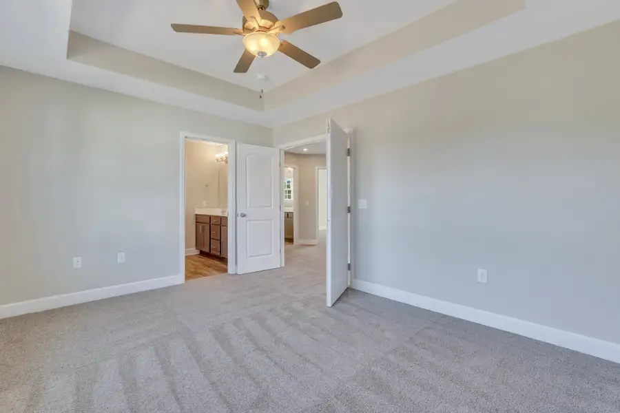 Rose Atoll Owner's Bedroom Entrance and Ceiling Detail | Ernest Homes