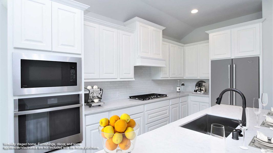 Representative furnished interior of a home built from the 2935M by Perry Homes in Lakes of Cane Island, Katy (Image 4).