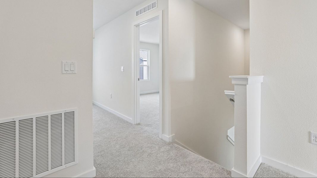 Furnished interior view inside a new home in Cyrene at Harmony, St. Cloud (Image 24).