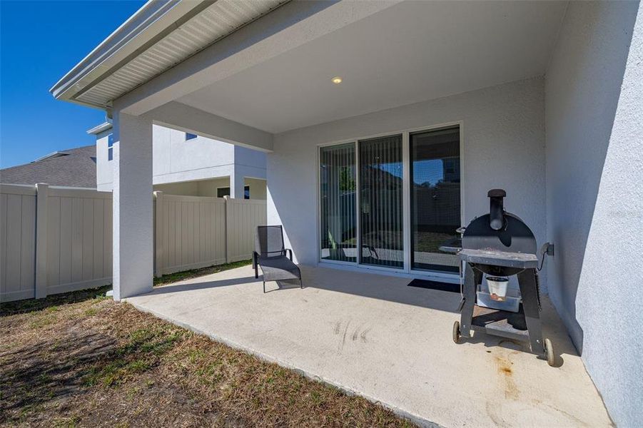Exterior details and patio area of a home in Hartwood Landing, Clermont (Image 4).