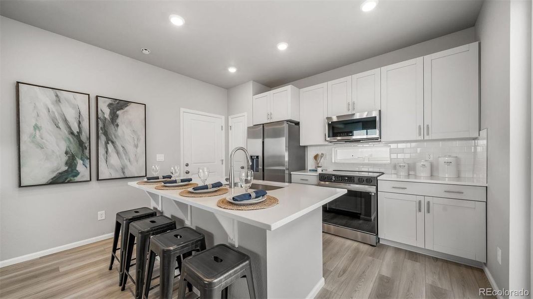 Furnished interior view inside a new home in , Aurora (Image 5).