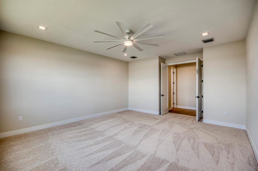 Furnished interior view inside a new home in Apex at Avenir, Palm Beach Gardens (Image 12).