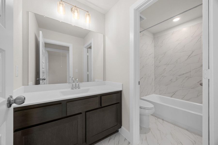 Furnished interior view inside a new home in The Colony, Bastrop (Image 8).