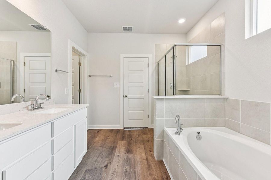 Furnished interior view inside a new home in Stallion Run, Buda (Image 13).