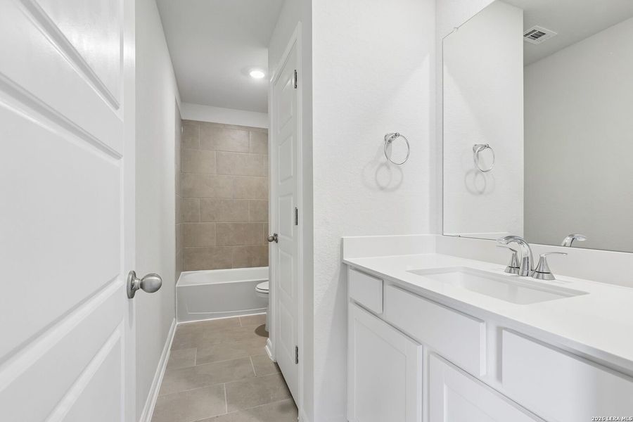 Furnished interior view inside a new home in Thomas Pond, San Antonio (Image 9).