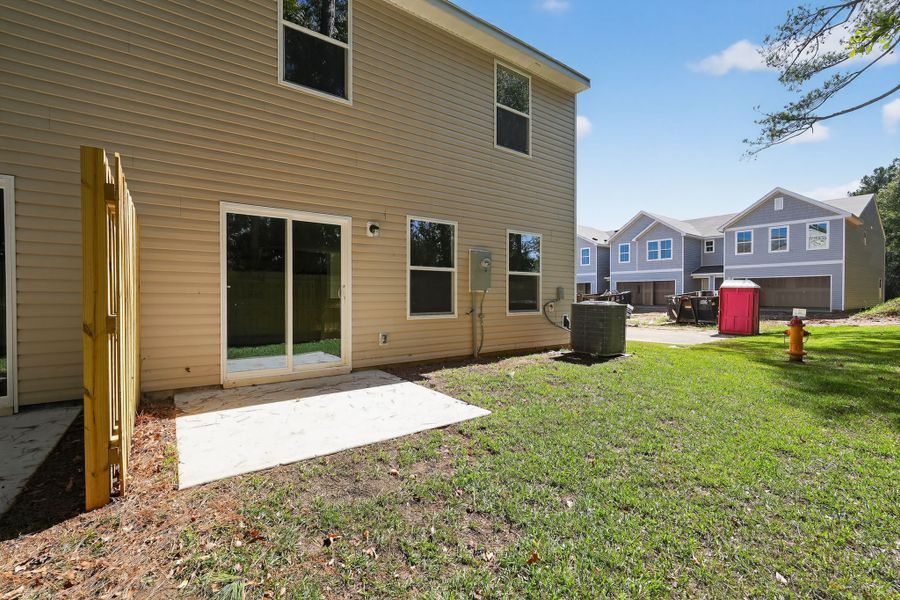 A house with a fire hydrant.