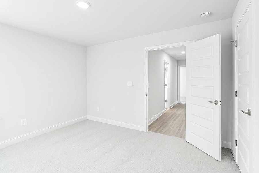 Spacious, unfurnished interior of a new home in Waters Edge, Mansfield (Image 26).