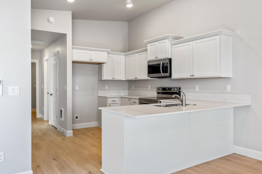 Furnished interior view inside a new home in Feather Ridge, Redmond (Image 6).