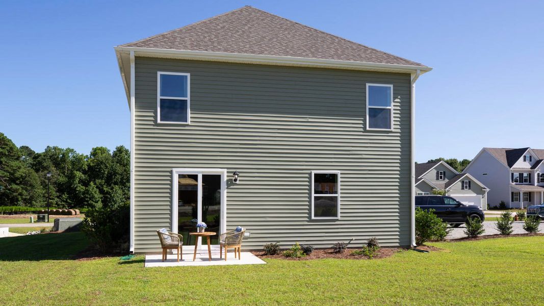 Front exterior of a new home in Surfside Landing, Hubert, NC, highlighting curb appeal (Image 2).