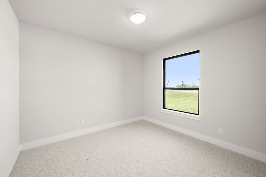 Front exterior of a new home in Carrera Ranch, Waxahachie, TX, highlighting curb appeal (Image 24).