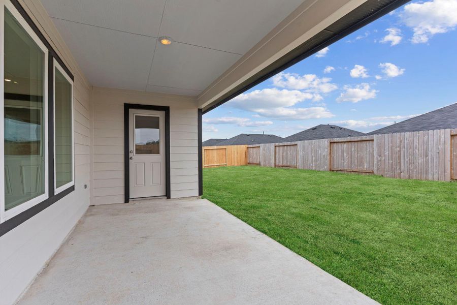 Exterior details and patio area of a home in Blue Heron Estates, Beasley (Image 3). Exterior details and patio area of a home in Blue Heron Estates, Beasley (Image 3).