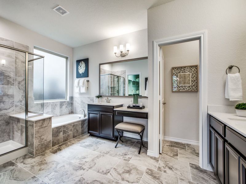 Owner's bath with separate vanity and tile-surround shower