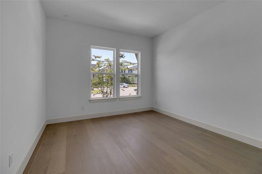 Spacious, unfurnished interior of a new home in The Grove Frisco, Frisco (Image 24).