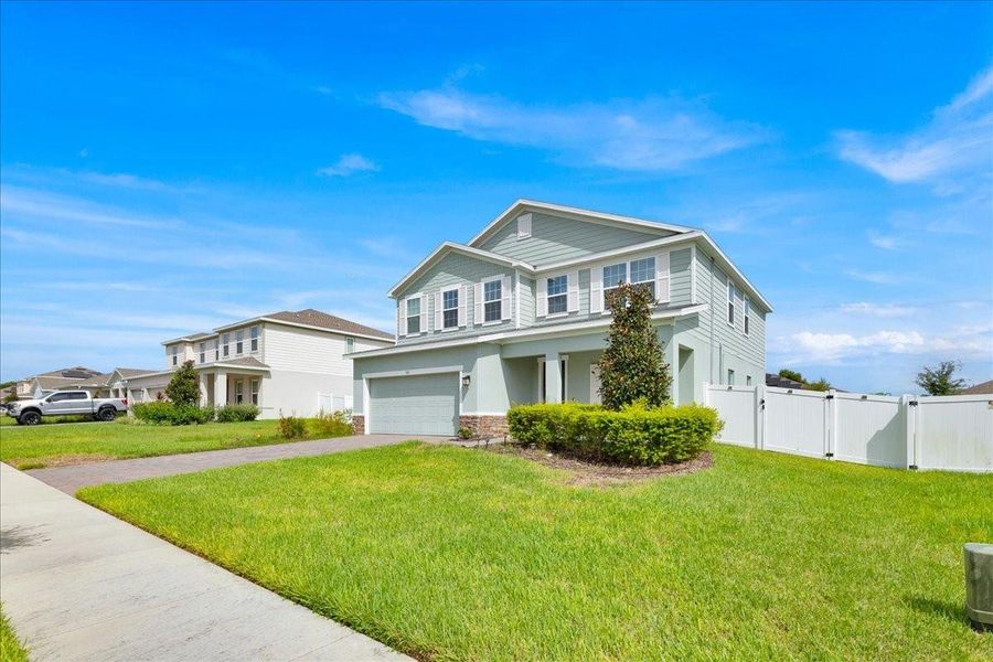 Front exterior of a new home in , Apopka, FL, highlighting curb appeal (Image 2).