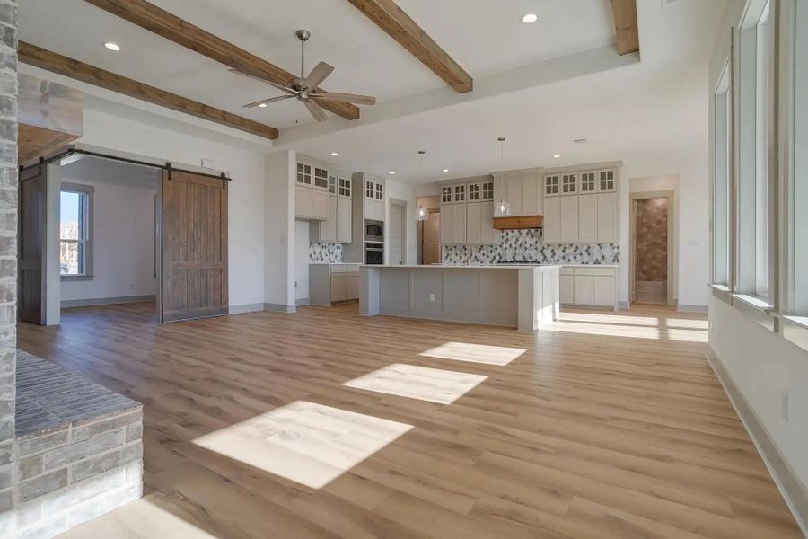 Representative unfurnished interior of a home built from the The Luke by Elmwood Custom Homes in Ranch at Stone Hill, Waxahachie (Image 37).