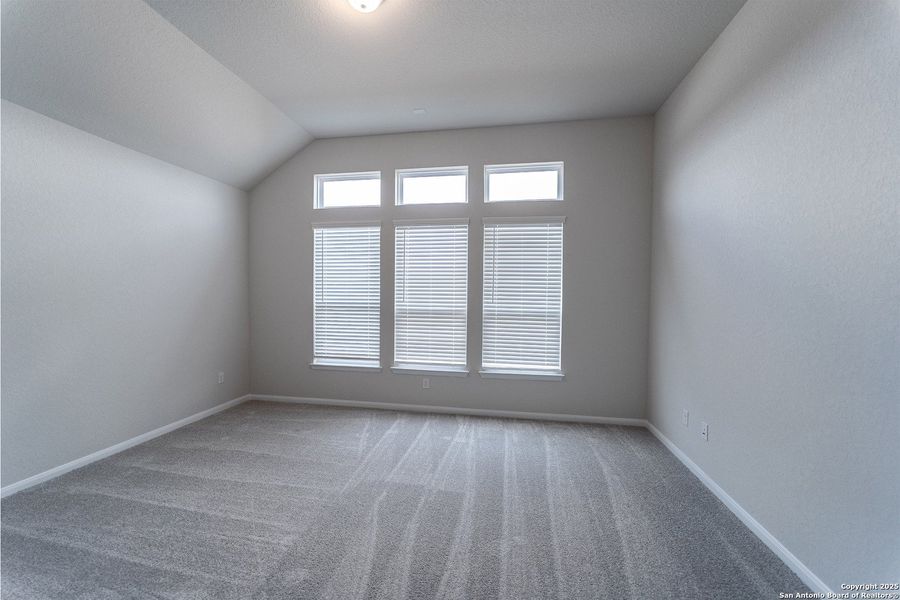 Spacious, unfurnished interior of a new home in The Woodlands at Medina Hills, Mico (Image 9).