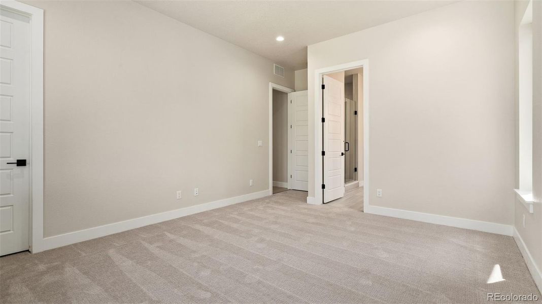 Spacious, unfurnished interior of a new home in Pelican Shores at Water Valley, Windsor (Image 14).