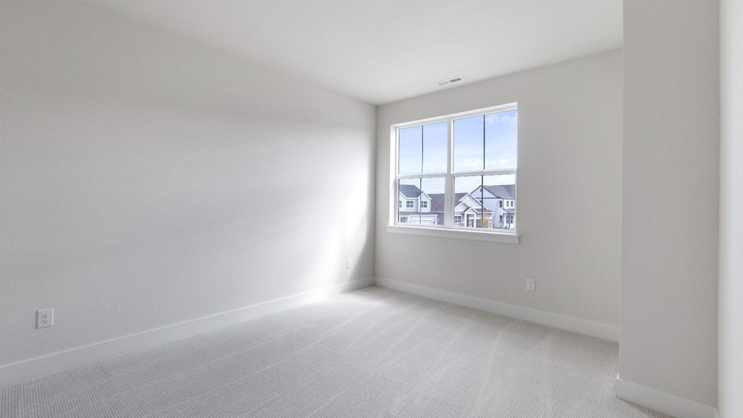 Furnished interior view inside a new home in Dillon Pointe - Journey, Broomfield (Image 23).