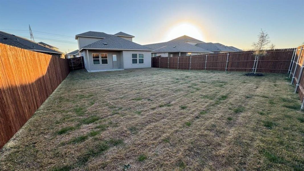 Exterior details and patio area of a home in Monarch at the Meadows, Ponder (Image 2).