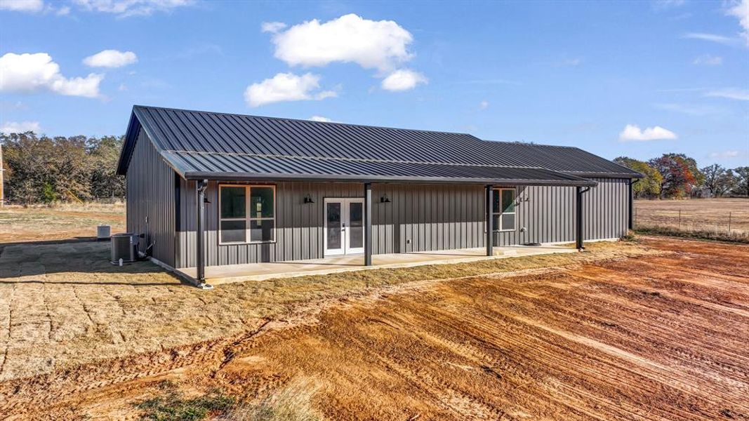 Exterior details and patio area of a home in , Whitt (Image 1). Exterior details and patio area of a home in , Whitt (Image 1).
