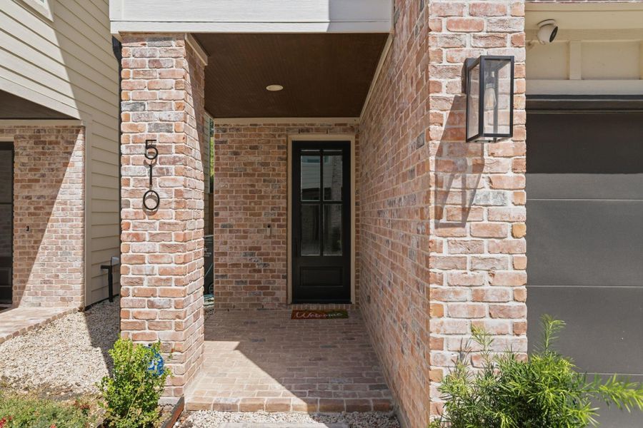 Exterior details and patio area of a home in , Houston (Image 3).