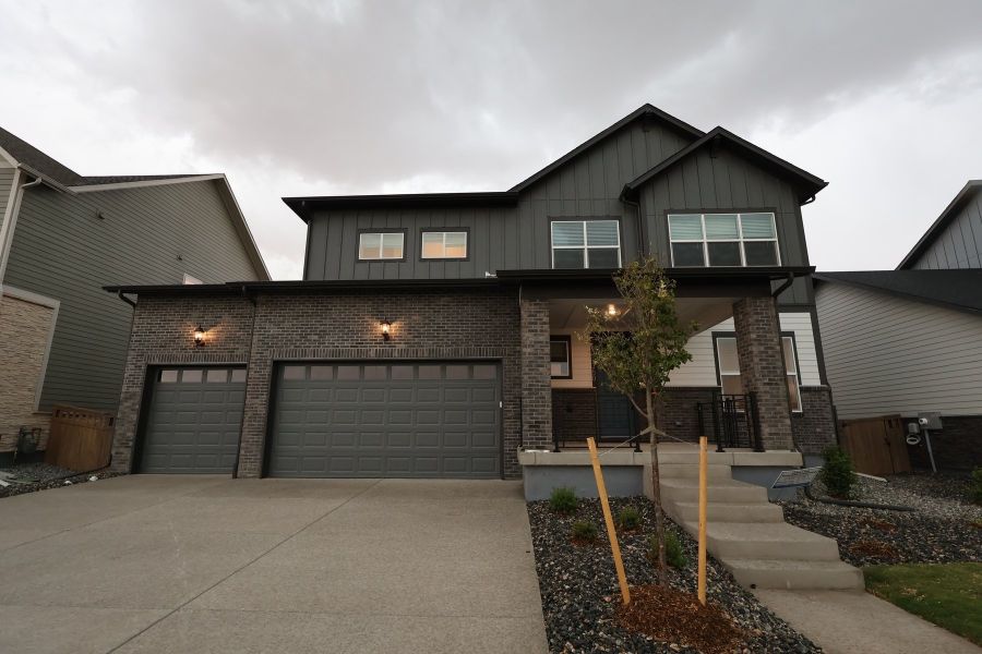 Front exterior of a home in the Painted Prairie Heritage Collection community, located in Aurora, CO (Image 4). Front exterior of a home in the Painted Prairie Heritage Collection community, located in Aurora, CO (Image 4).