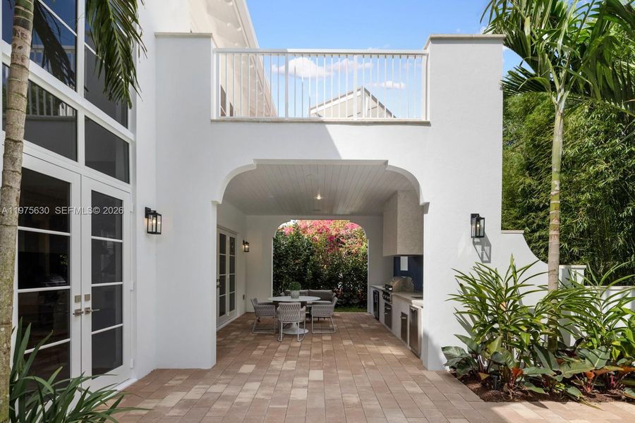 Exterior details and patio area of a home in , Coral Gables (Image 24).