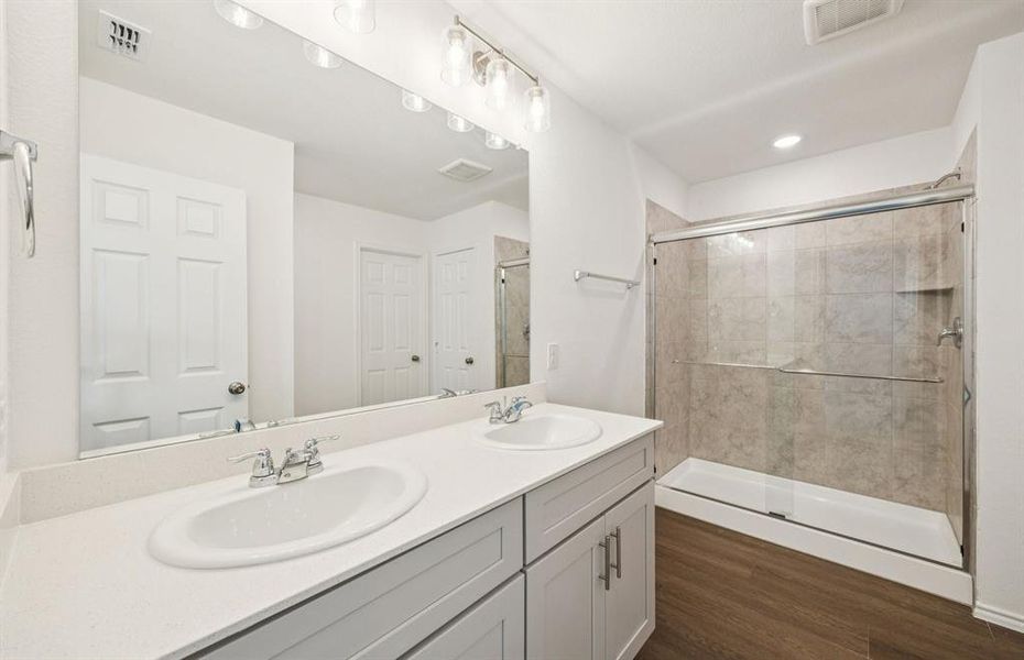 Owner's private bath with double vanity
