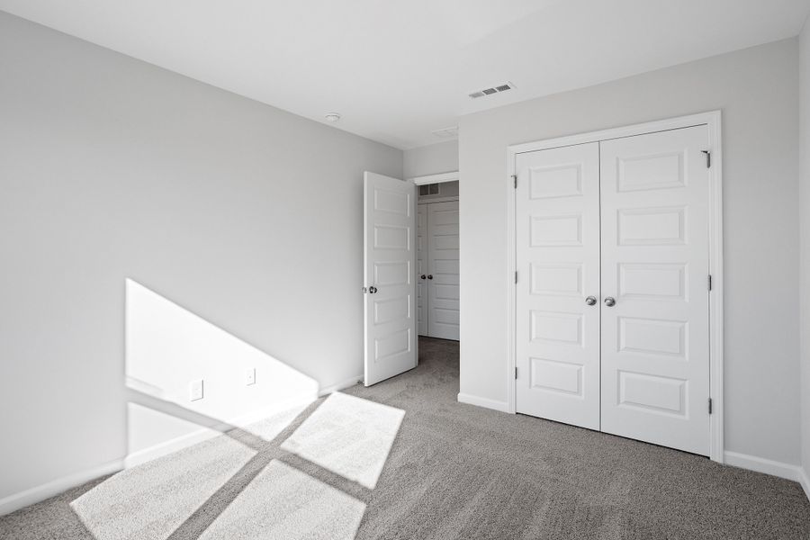 Spacious, unfurnished interior of a new home in Renaissance at White Oak, Garner (Image 28). Spacious, unfurnished interior of a new home in Renaissance at White Oak, Garner (Image 28).