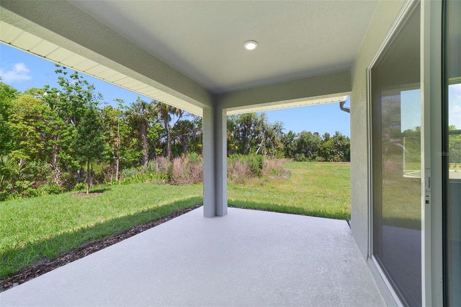 Exterior details and patio area of a home in Estates at Lake Jesup, Sanford (Image 3).